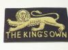 The King's Own blazer badge