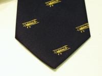 Tiger Moth polyester Gold on navy motif tie