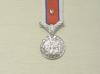 Hors de Combat miniature medal with poppy